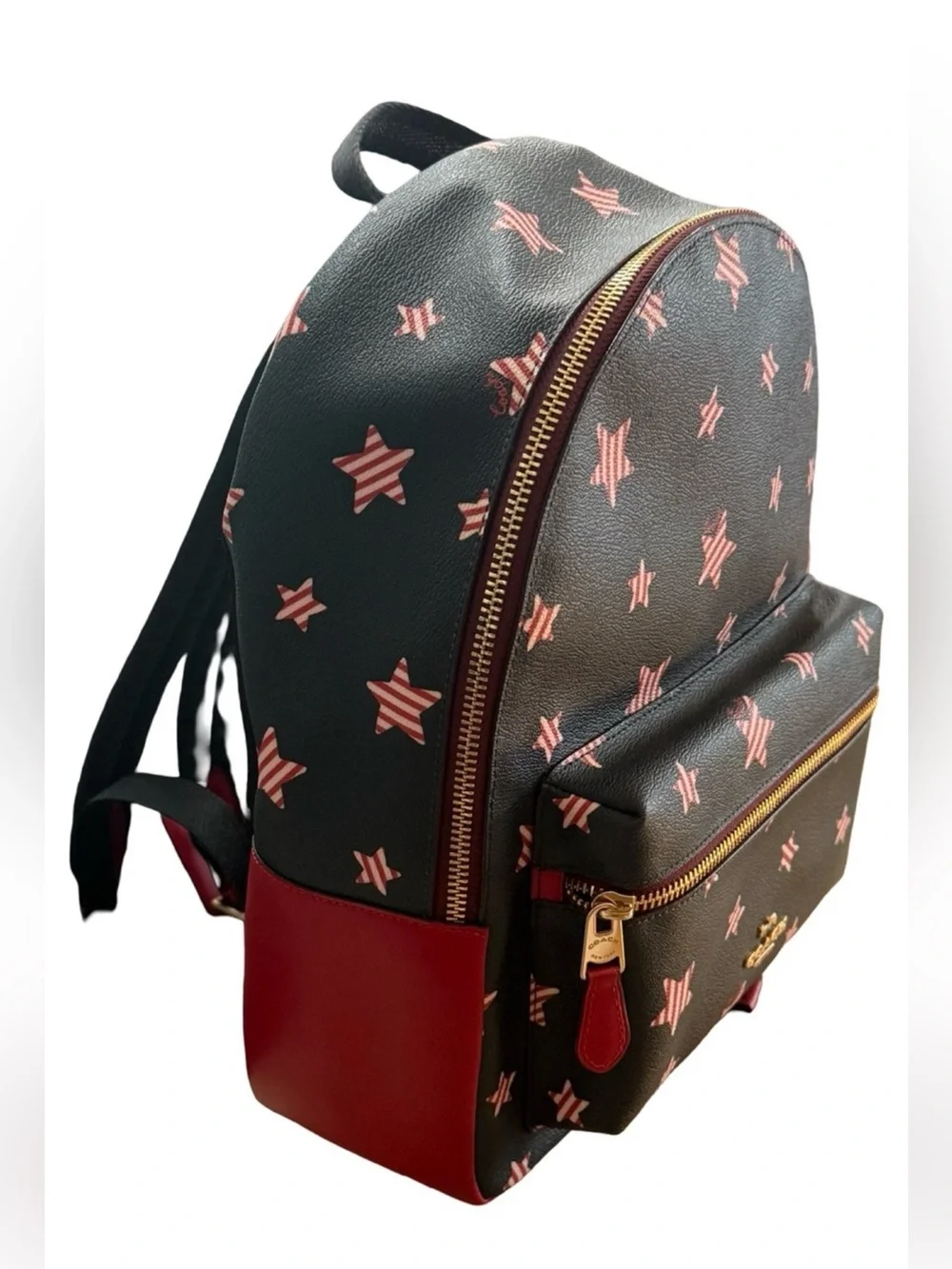 Coach Black Leather Backpack with Red Star Motif and Red Trim